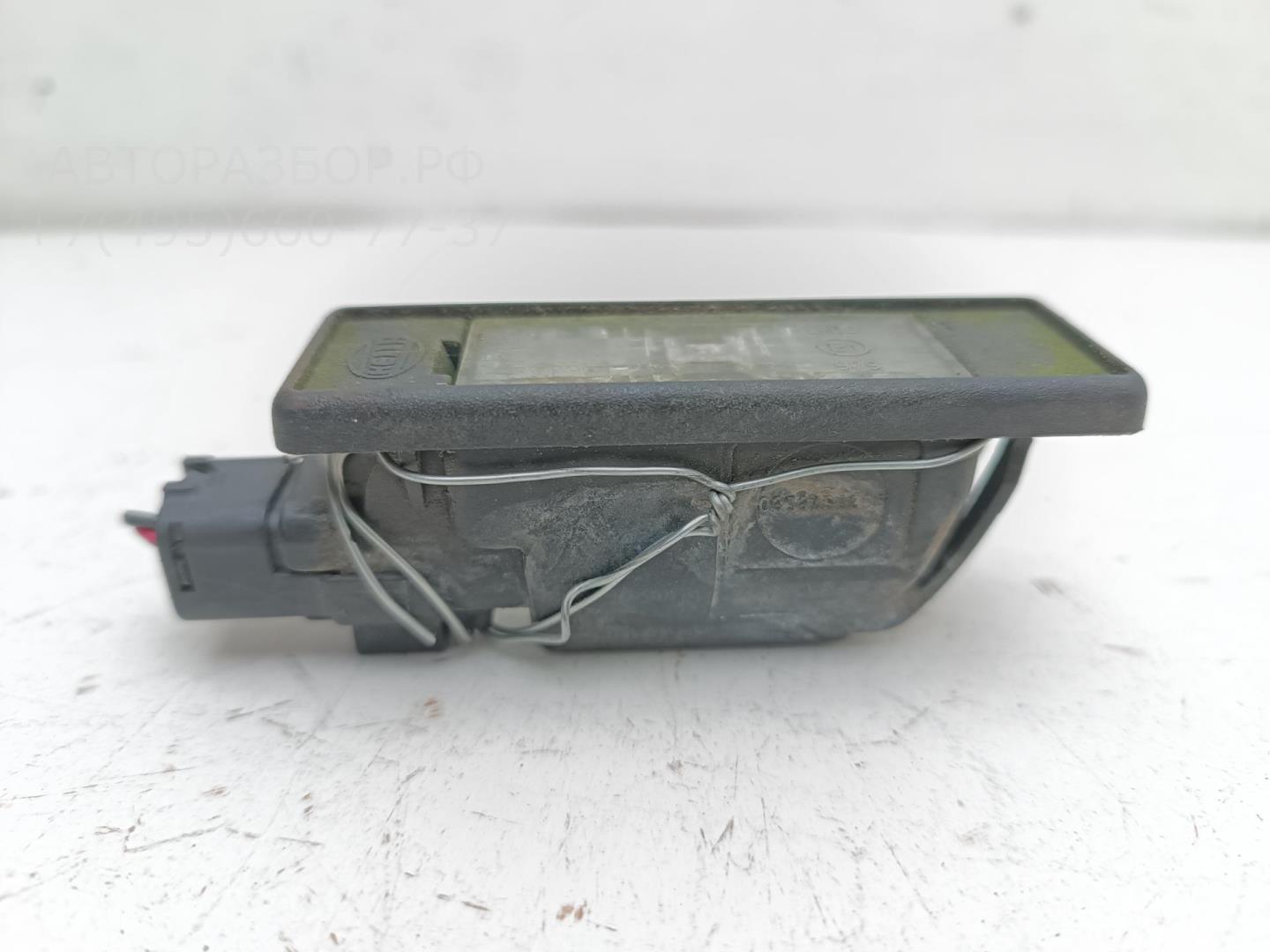 Фонарь подсветки номера