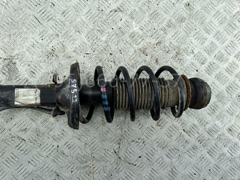 Амортизатор передний левый