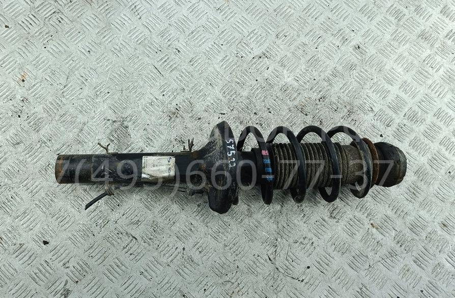 Амортизатор передний левый