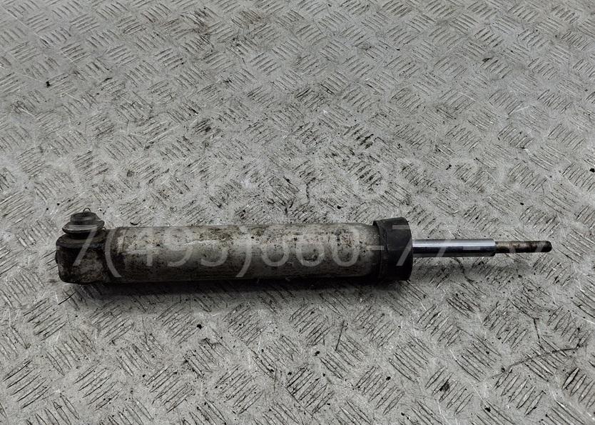 Амортизатор задний левый