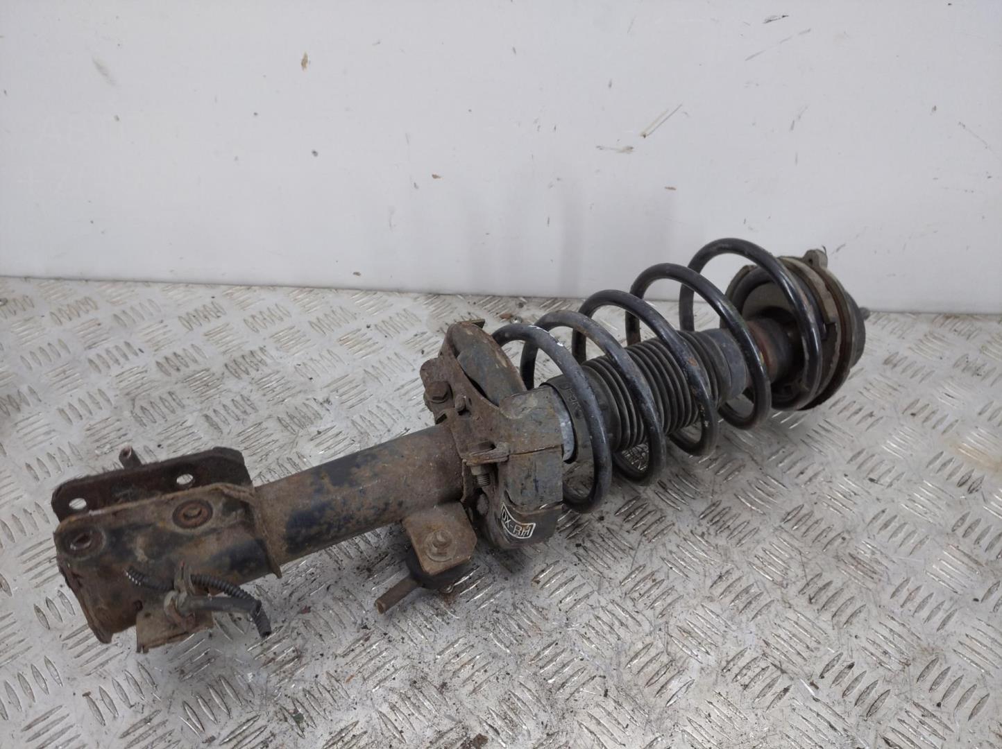 Амортизатор передний левый