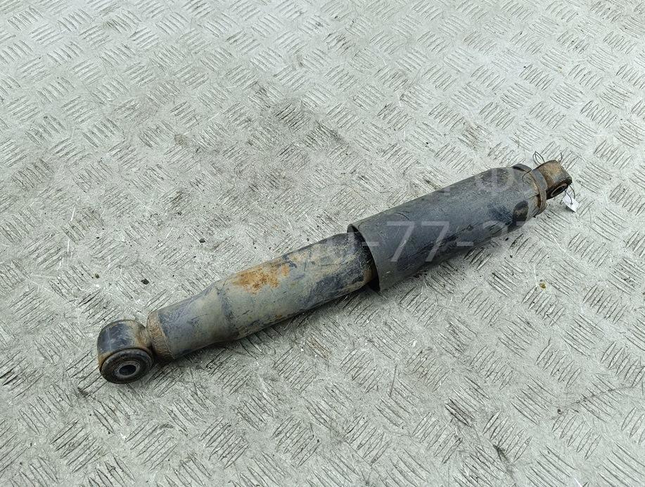 Амортизатор задний левый