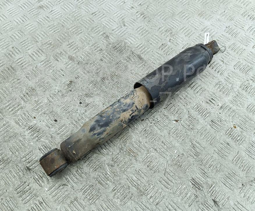 Амортизатор задний левый