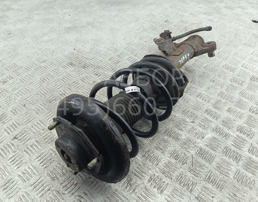 Амортизатор передний левый