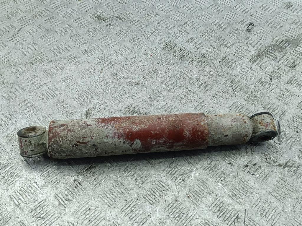 Амортизатор задний левый