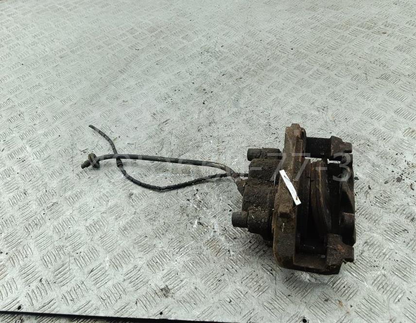 Суппорт передний левый