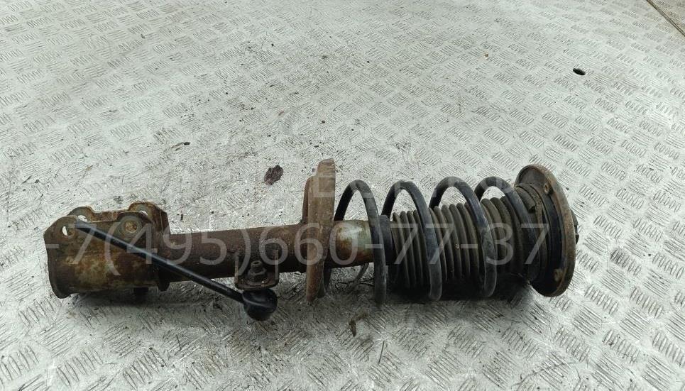 Амортизатор передний левый