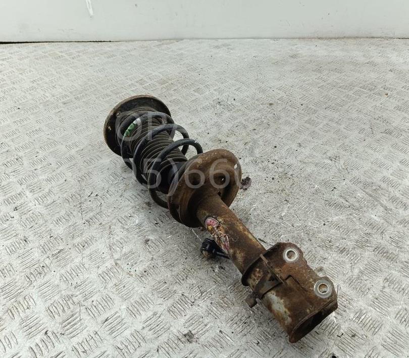 Амортизатор передний левый