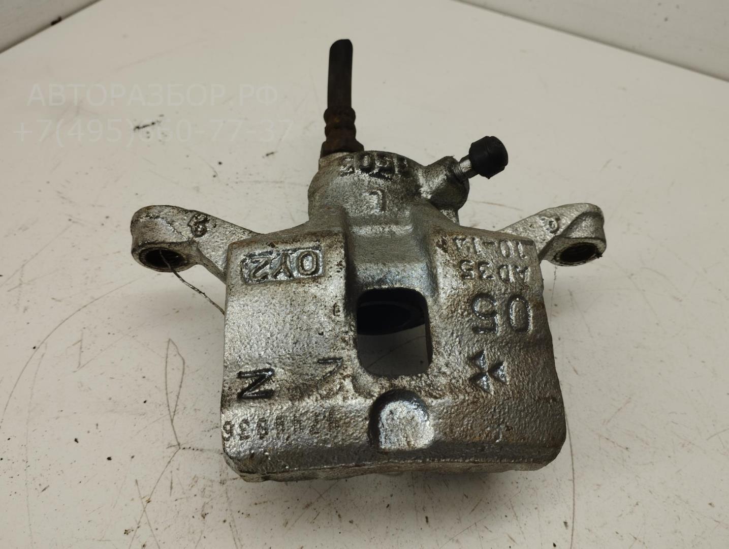 Суппорт задний левый