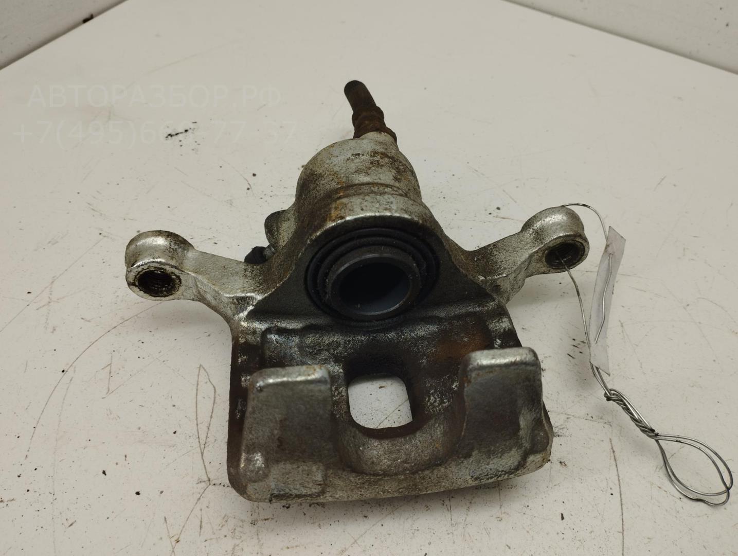 Суппорт задний левый