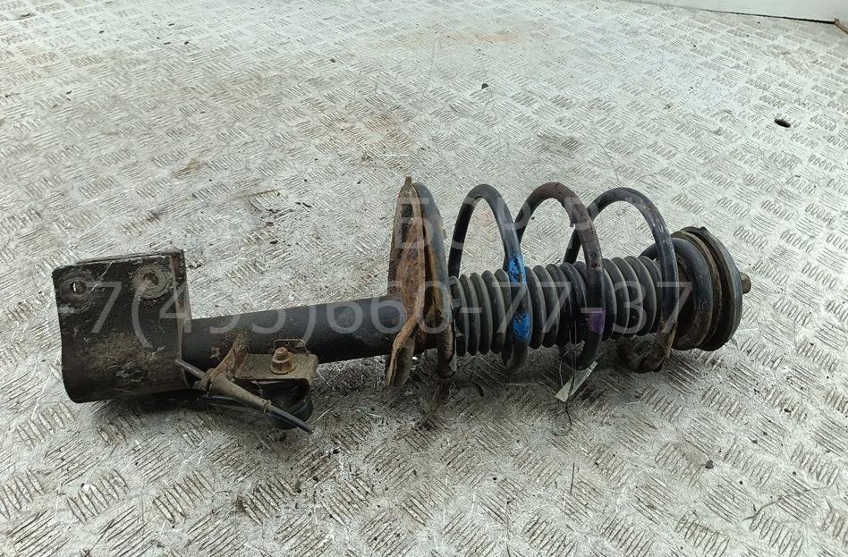 Амортизатор передний левый