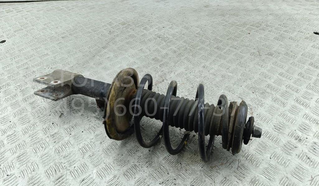 Амортизатор передний левый