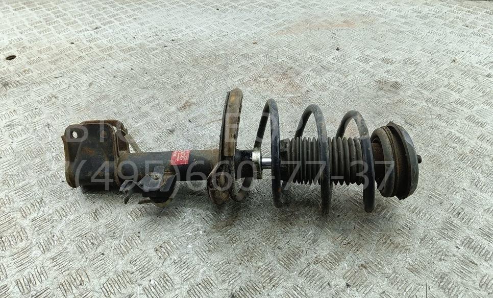 Амортизатор передний левый