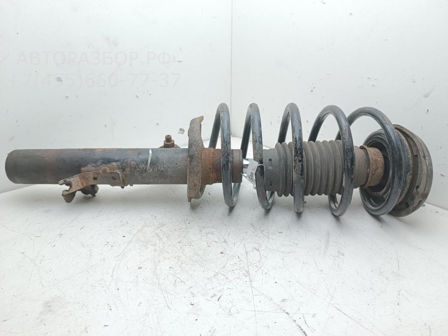 Амортизатор передний левый