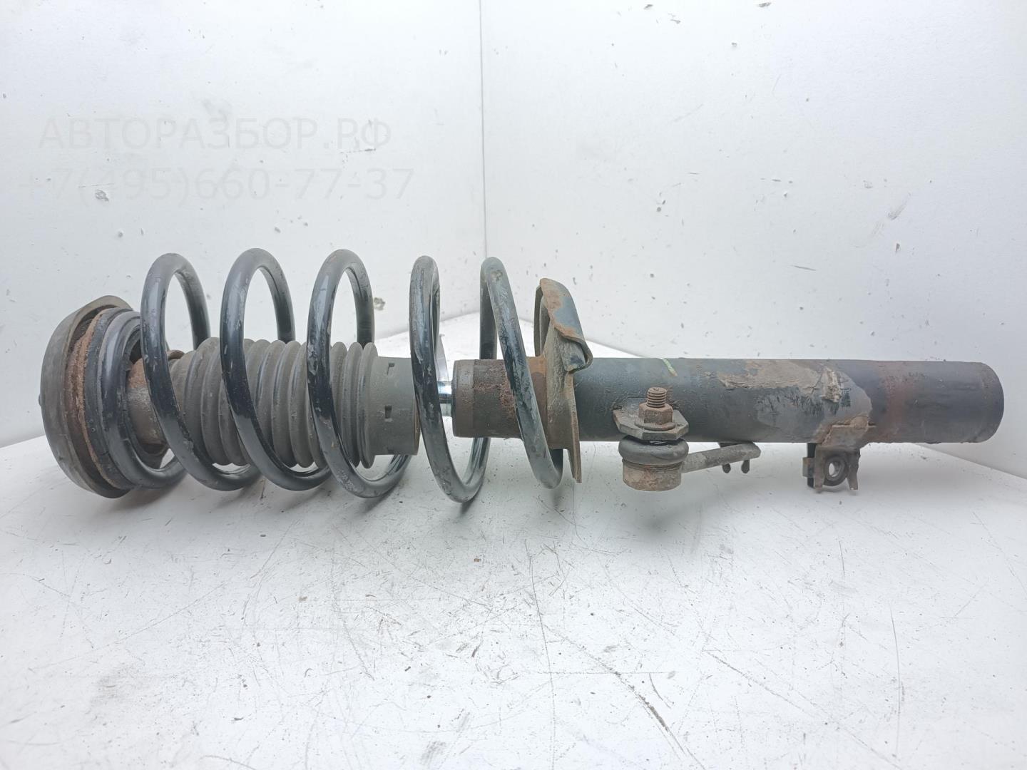 Амортизатор передний левый