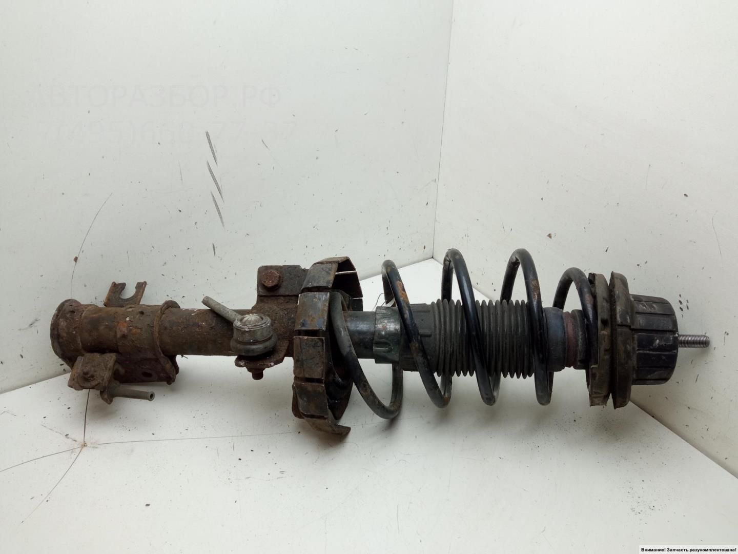 Амортизатор передний левый