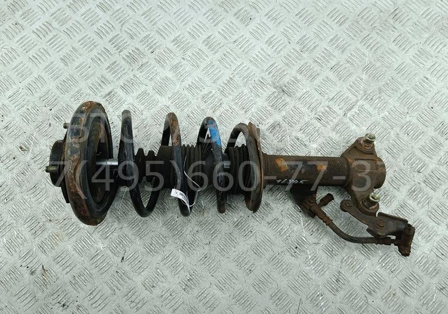 Амортизатор передний левый