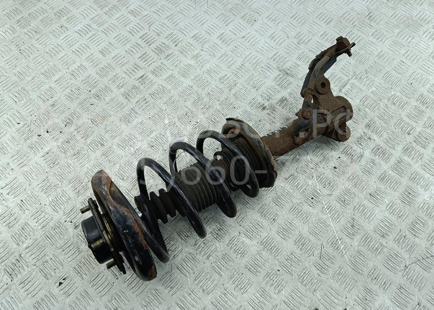 Амортизатор передний левый