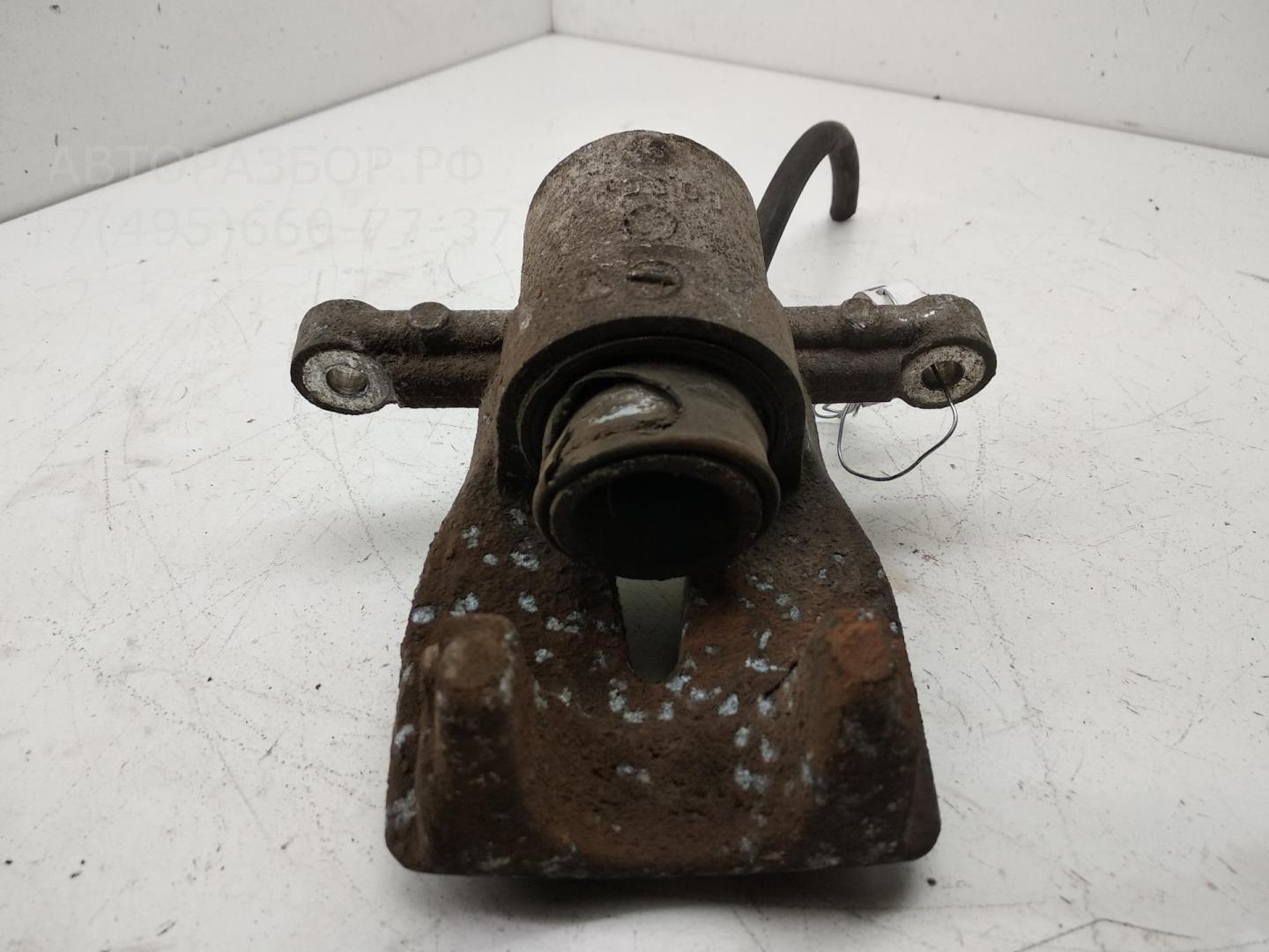 Суппорт задний левый