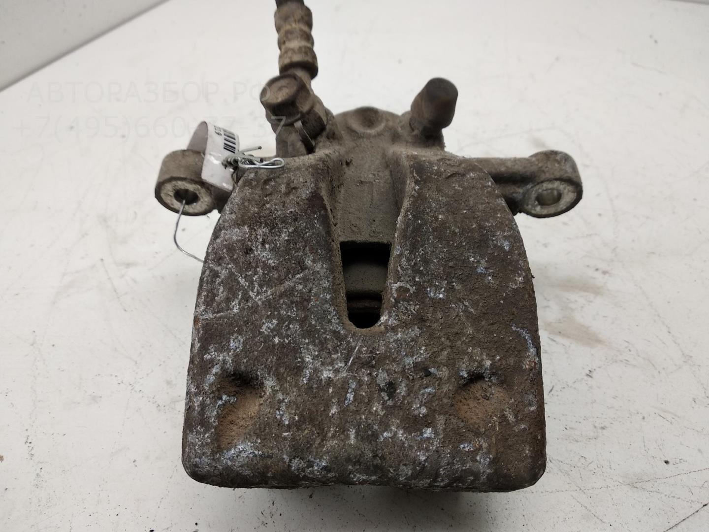 Суппорт задний левый