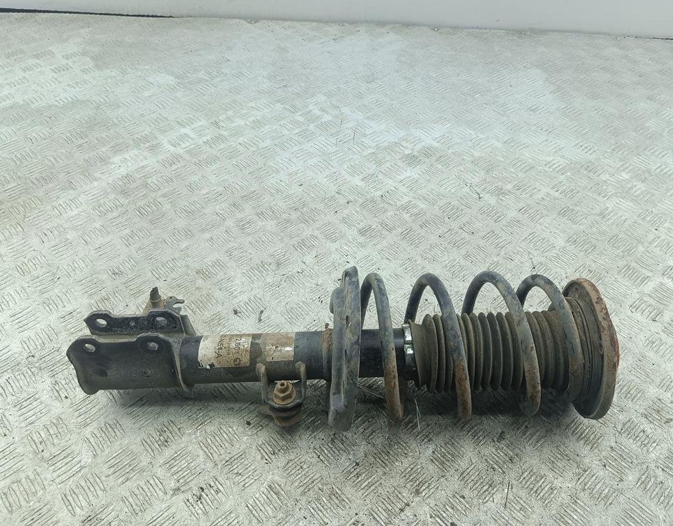 Амортизатор передний левый