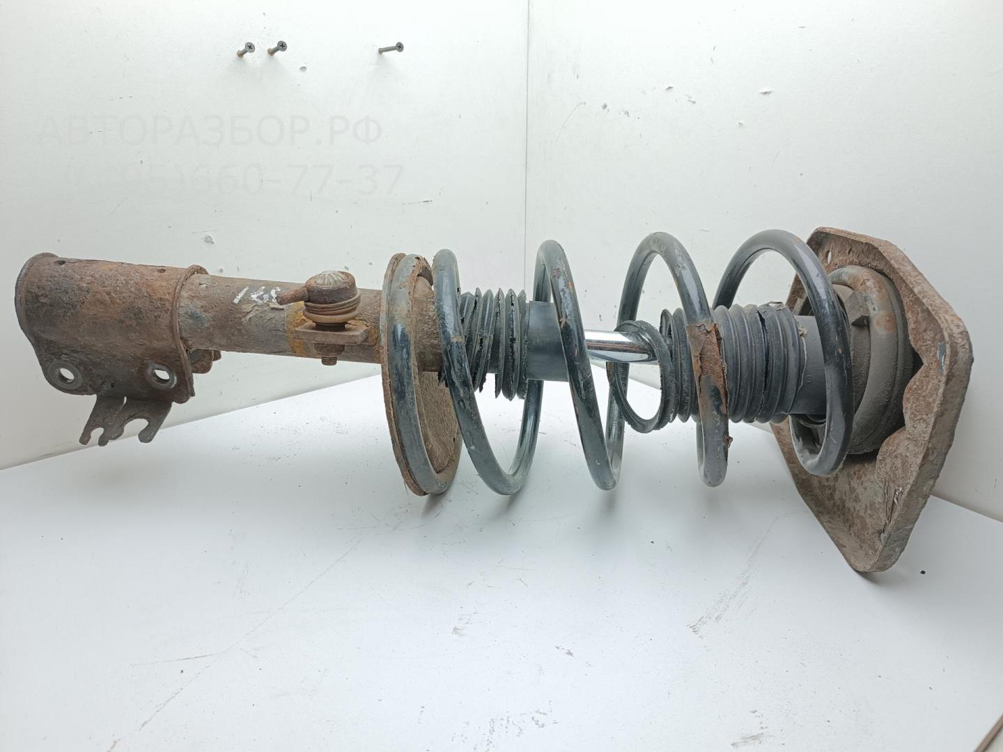 Амортизатор передний левый