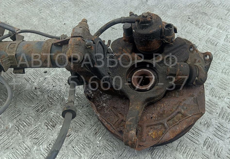 Амортизатор передний левый