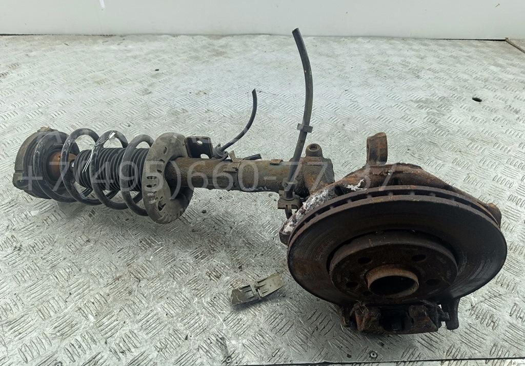 Амортизатор передний левый