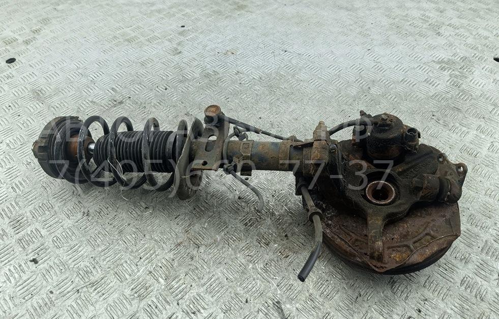 Амортизатор передний левый