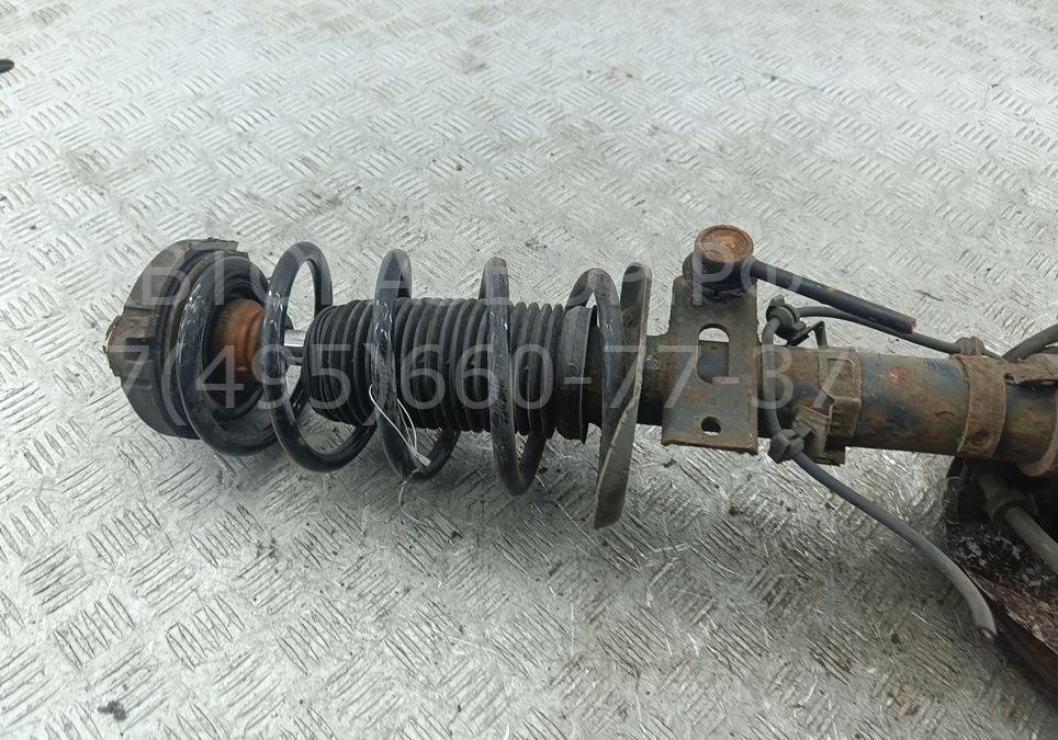 Амортизатор передний левый