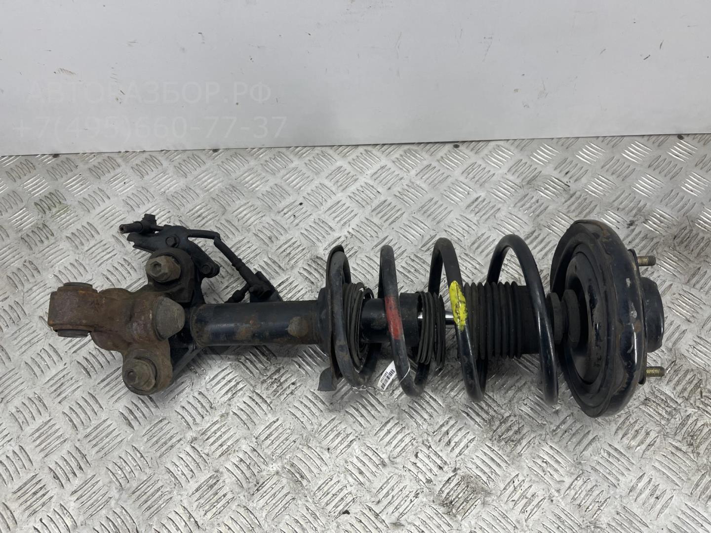 Амортизатор передний левый