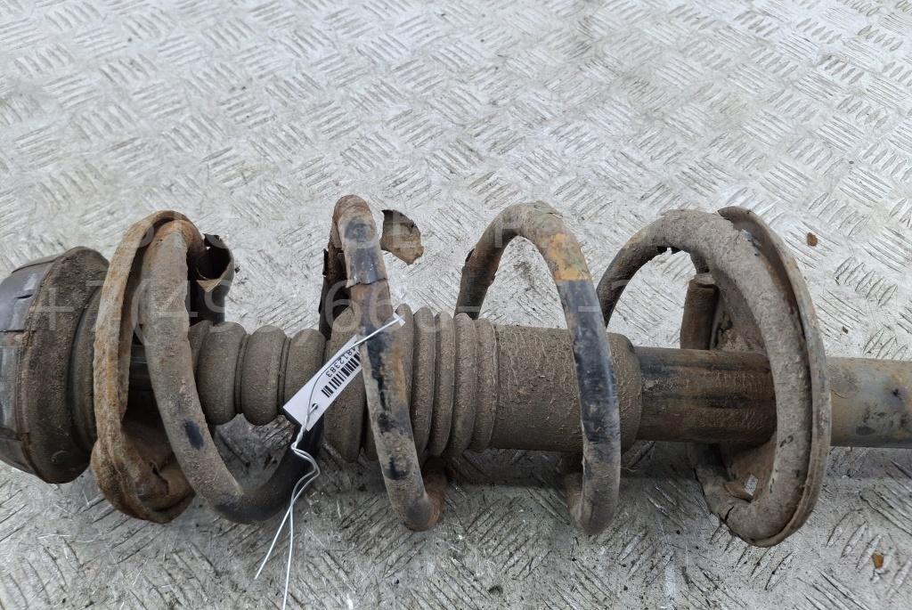 Амортизатор передний левый