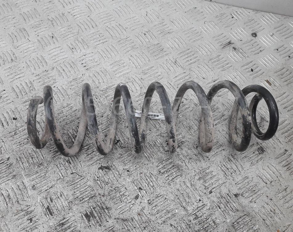 Пружина задняя