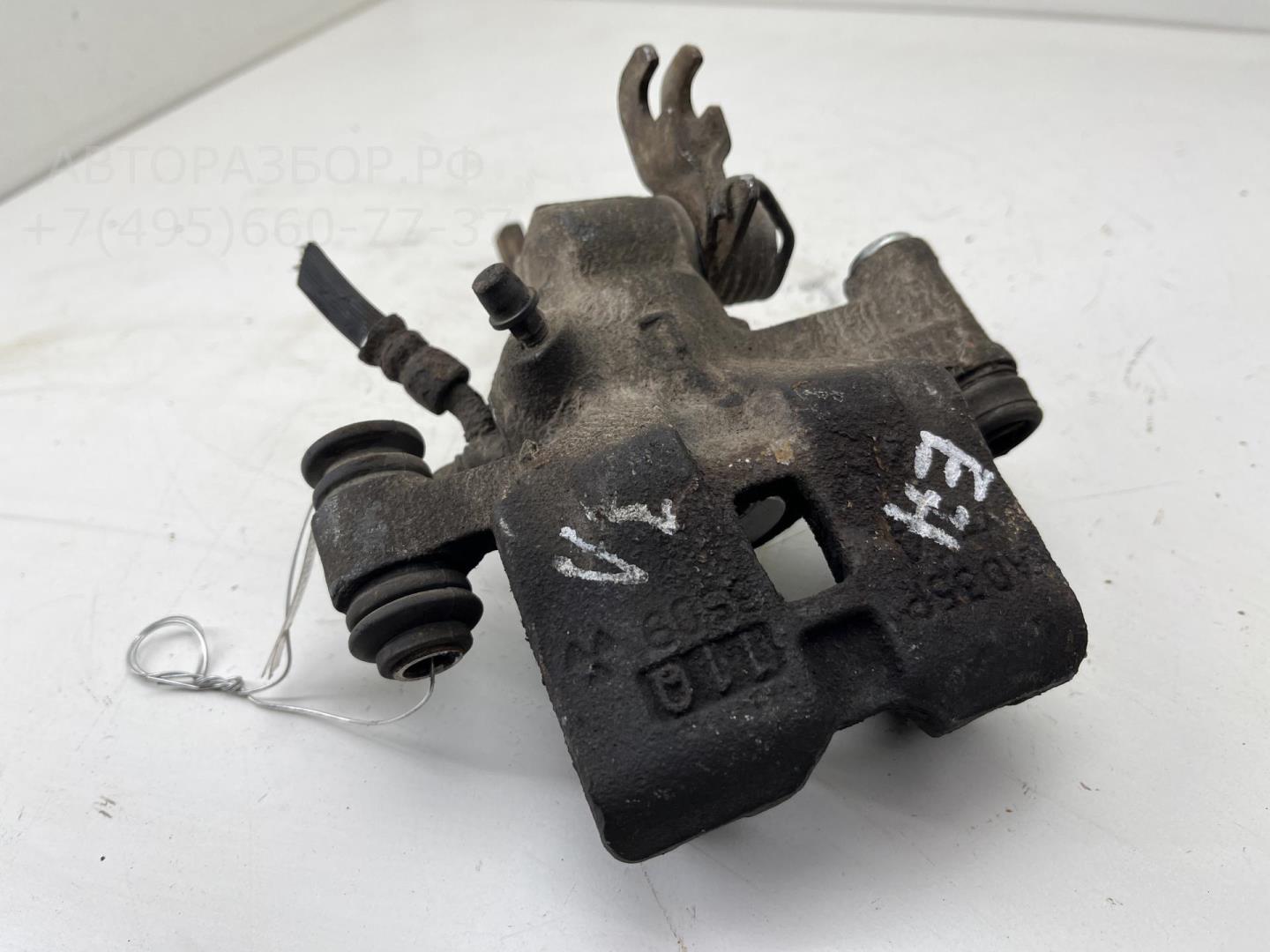 Суппорт задний левый