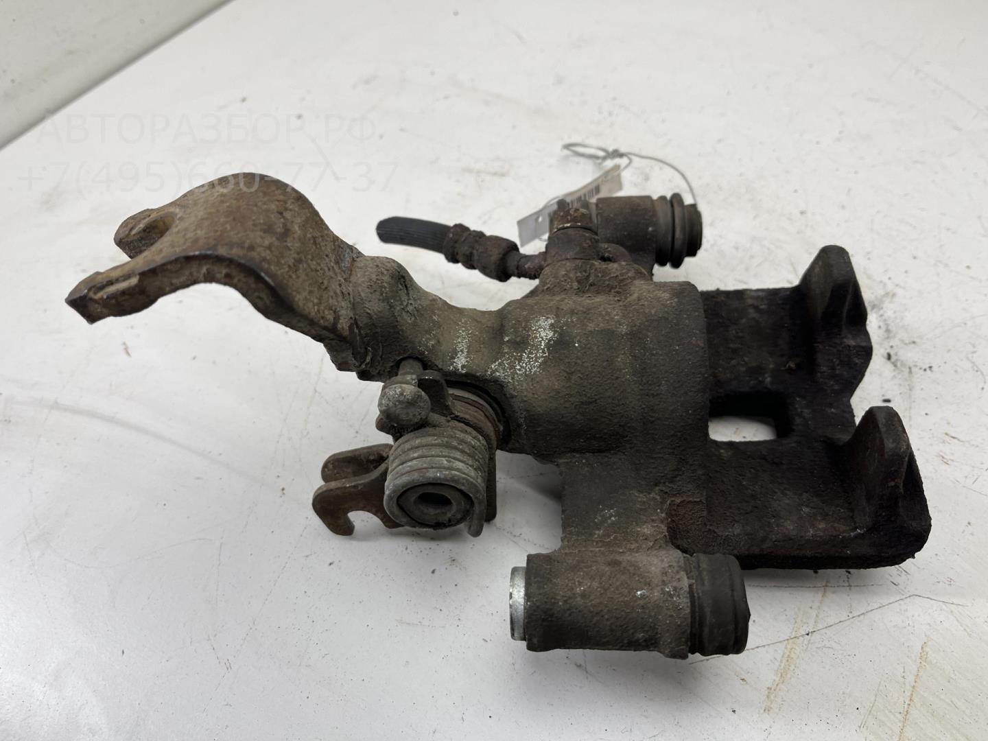 Суппорт задний левый