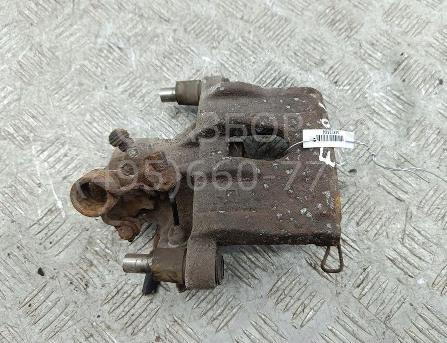 Суппорт задний левый