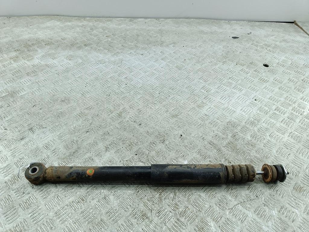 Амортизатор задний левый