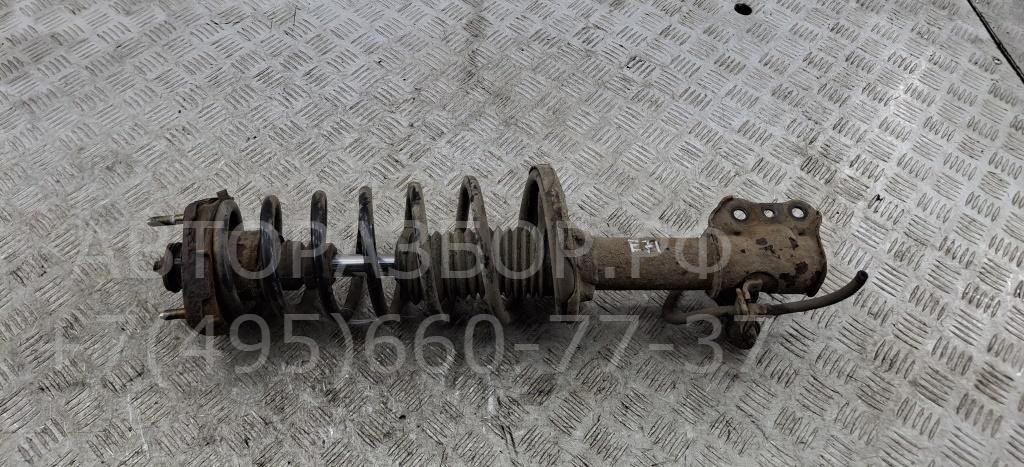 Амортизатор задний левый