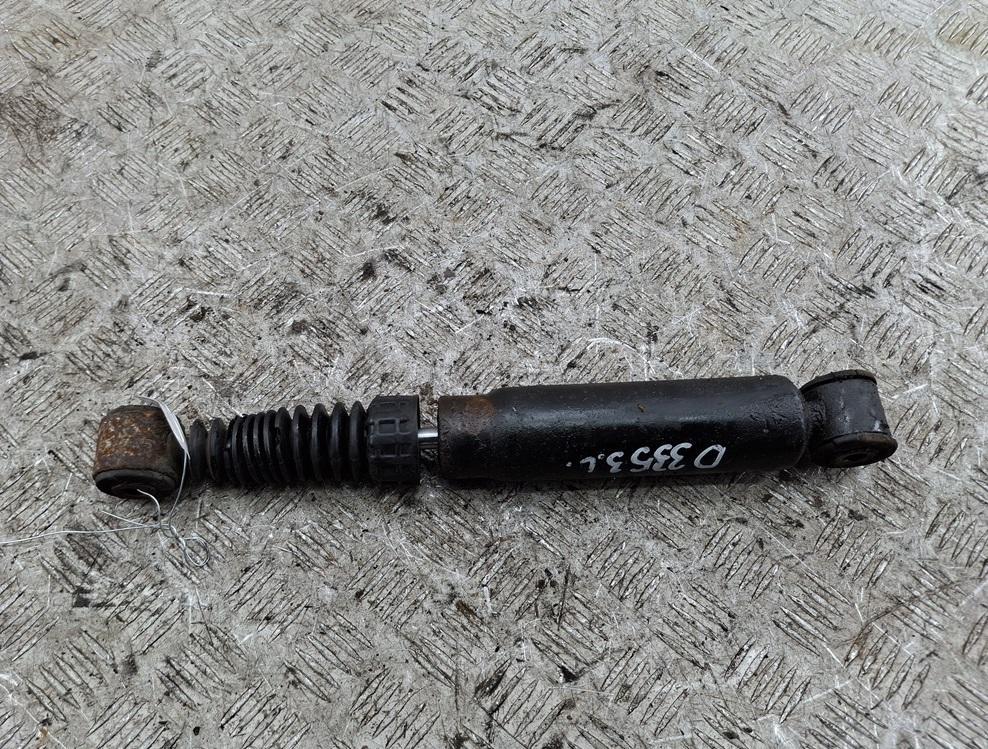 Амортизатор задний левый