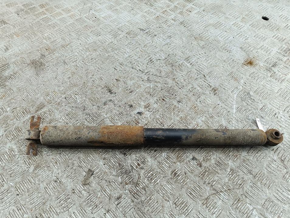 Амортизатор задний левый