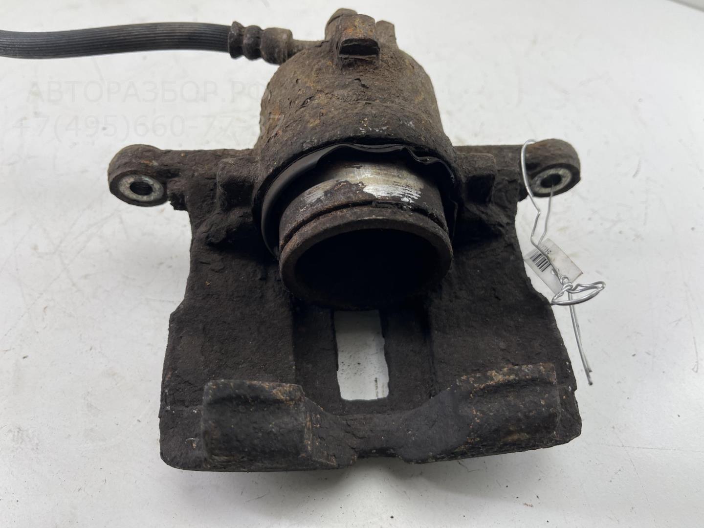 Суппорт передний левый