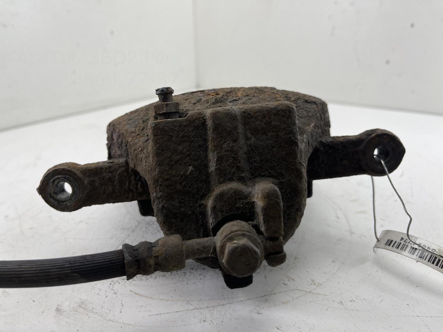 Суппорт передний левый