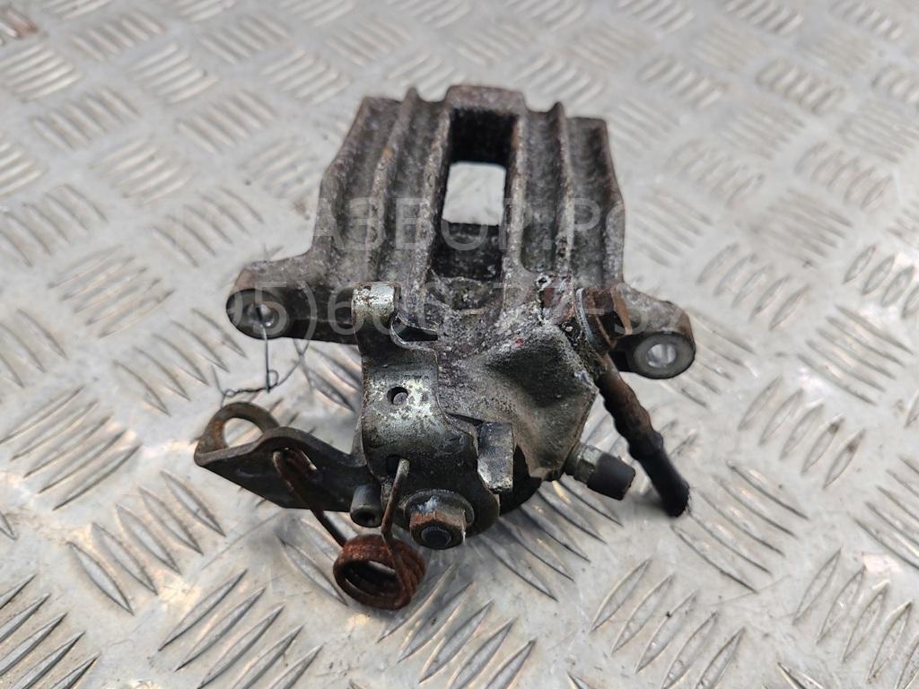 Суппорт задний левый