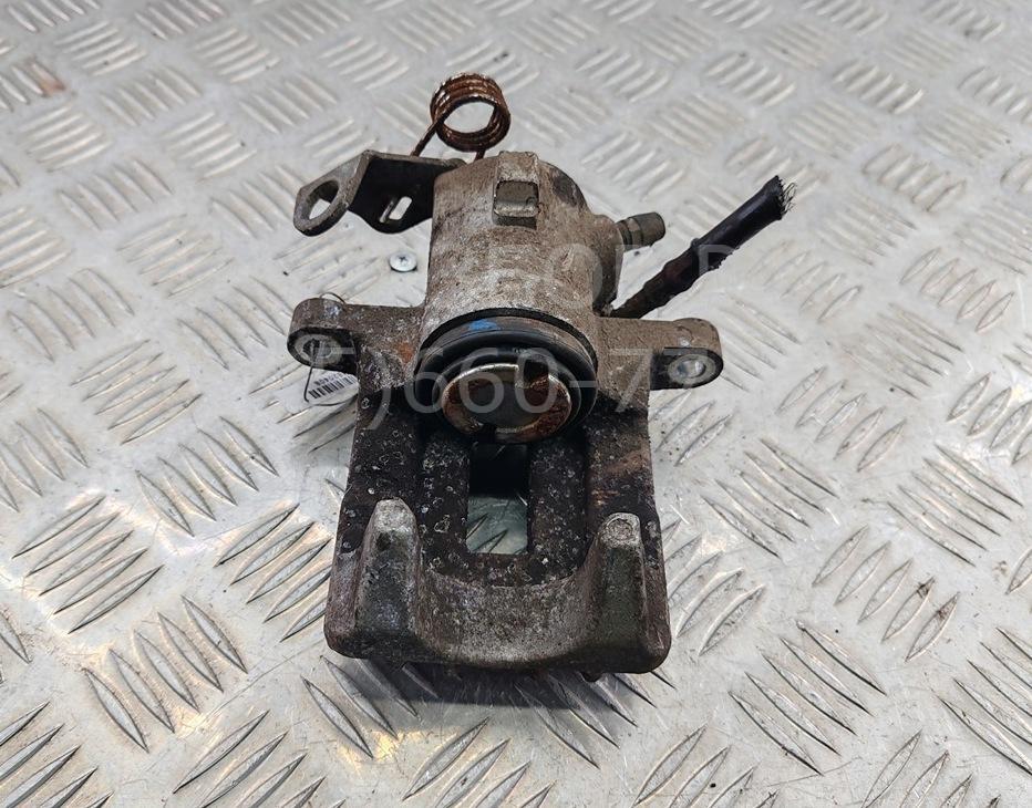 Суппорт задний левый