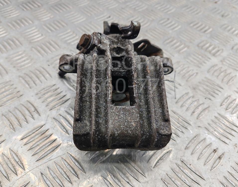 Суппорт задний левый