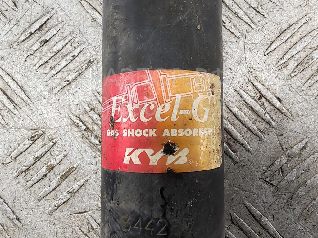 Амортизатор задний левый