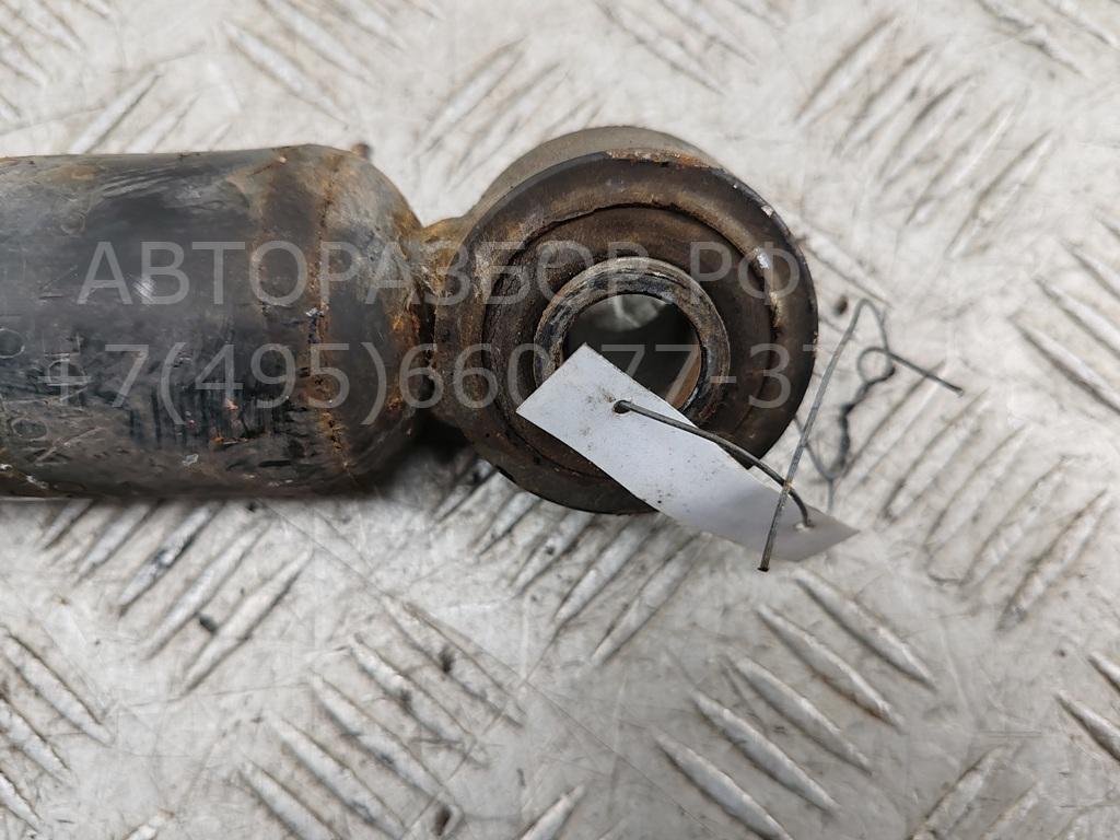 Амортизатор задний левый