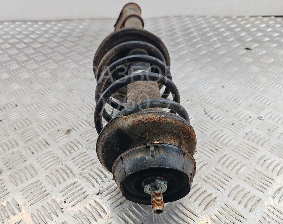 Амортизатор передний левый