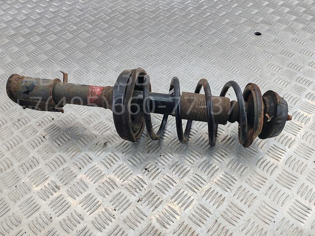 Амортизатор передний левый