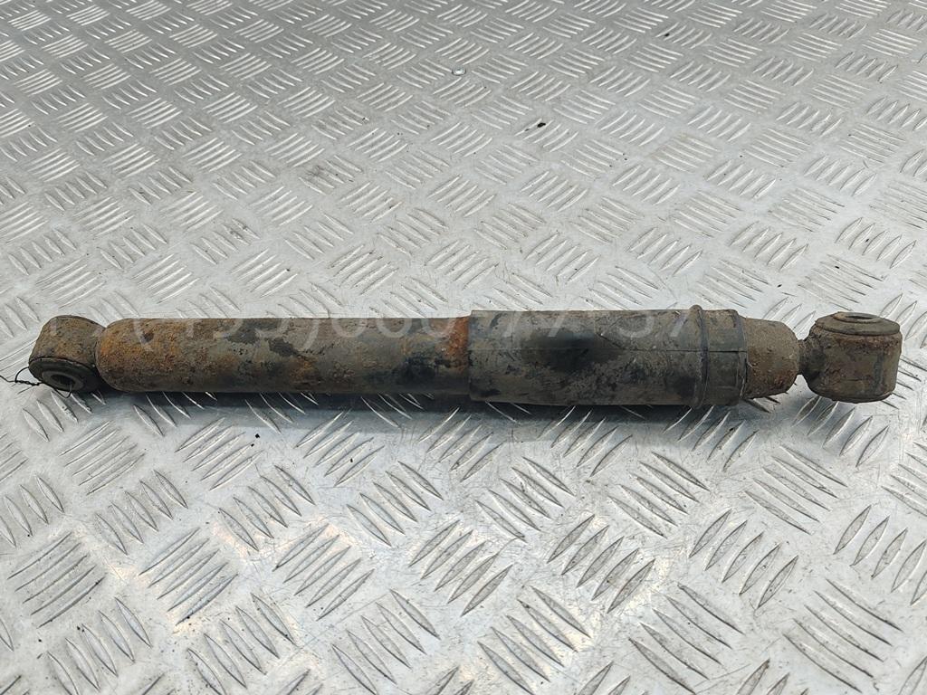 Амортизатор задний левый